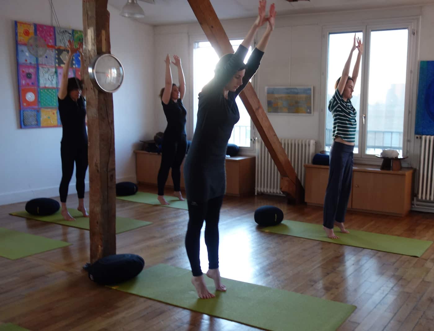 eleve d'un cours de yoga